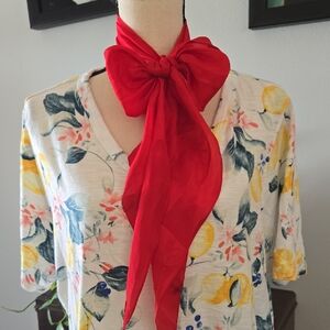Vibrant Floral Top with Red Bow
